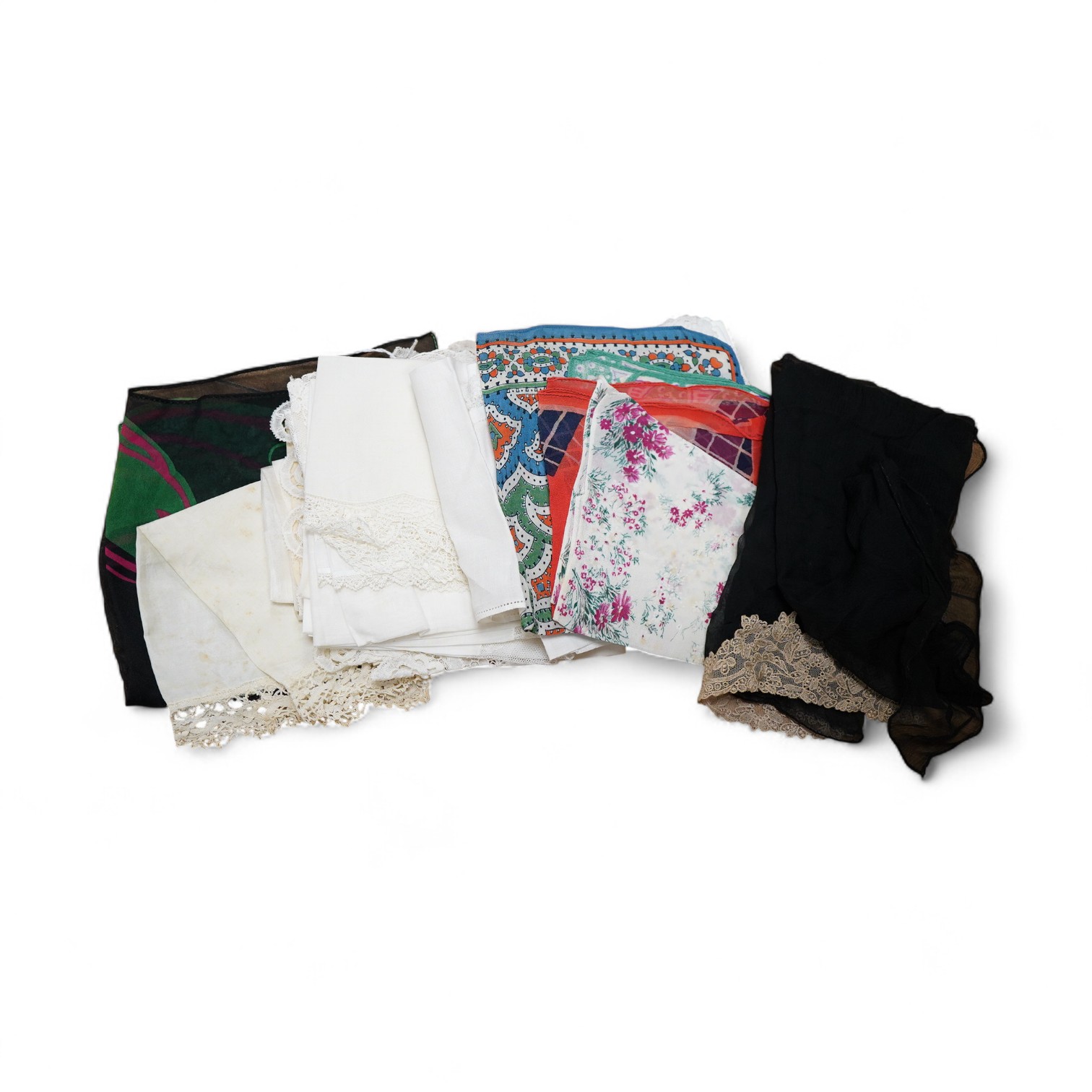 A collection of hankies, including a silk circa 1985 Christian Dior silk advertising ‘Poison’ hanky, Honiton bobbin lace and four other bobbin lace hankies, mixed machine lace hankies and 1930’s printed hankies. 33cm squ